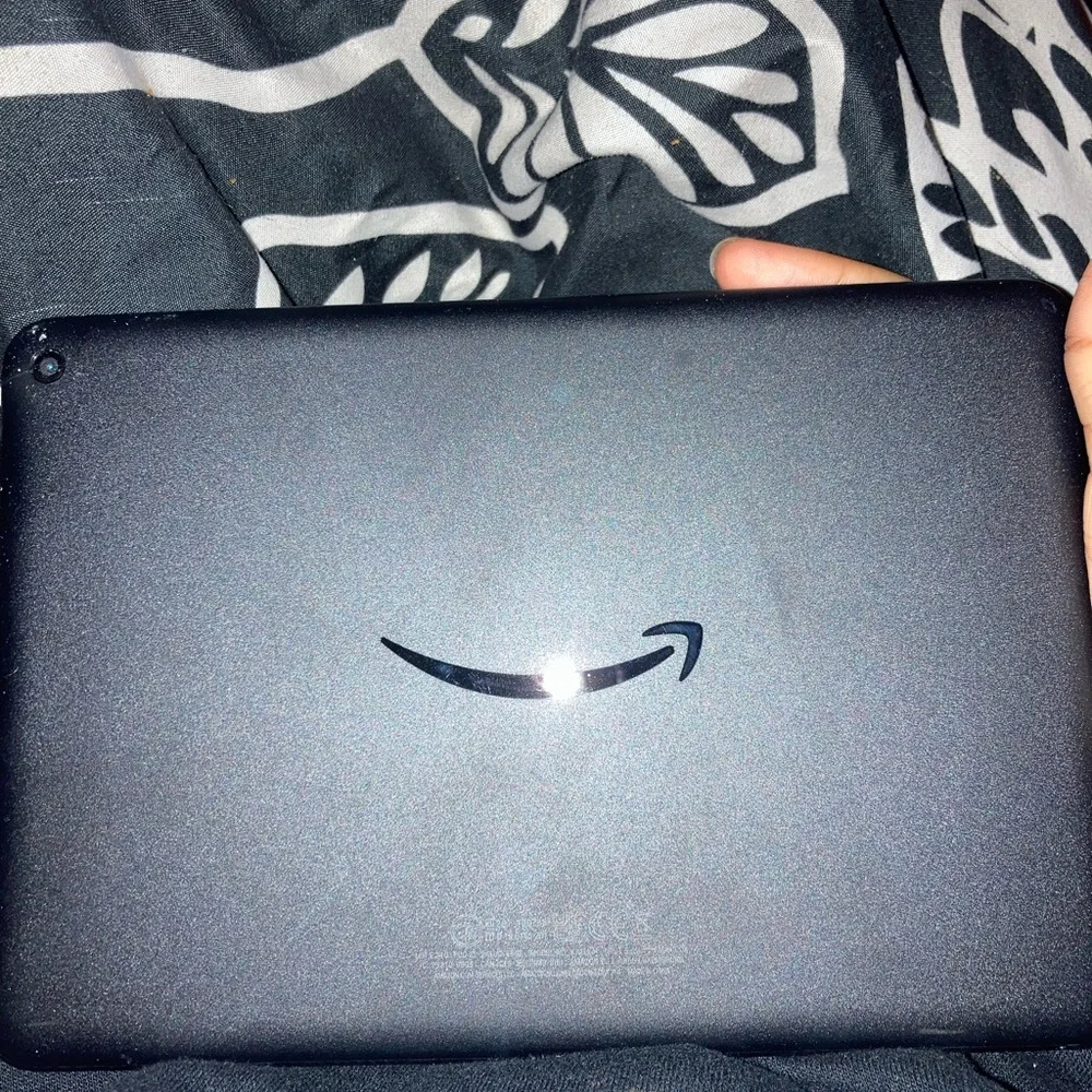 Black Fire tablet , charger and case included .